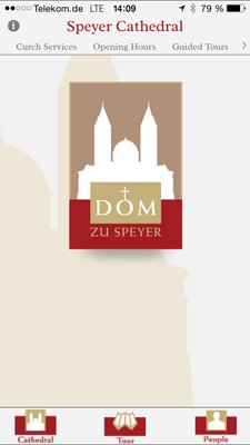 Smartphone mit Startbildschirm der Dom-App